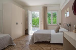 Postel nebo postele na pokoji v ubytování Hotel Giardino Suites&Spa