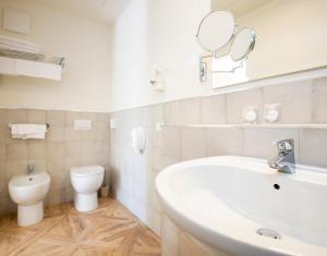 Koupelna v ubytování Hotel Giardino Suites&Spa