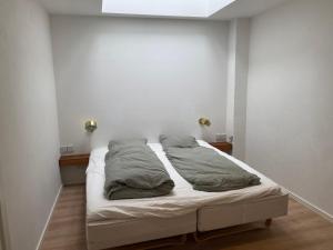 Postel nebo postele na pokoji v ubytování Aalborg - Beautifully renovated luxus apartment