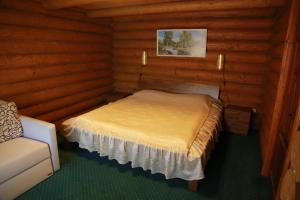 Postel nebo postele na pokoji v ubytování Tourist complex Karina