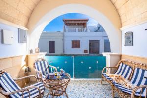 The swimming pool at or close to Luxury Apartments - Torre San Giovanni