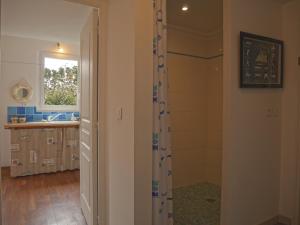 a bathroom with a shower and a sink at Maison de qualité avec jardin paysager à Sauzon - FR-1-418-38 in Sauzon +8 photos
