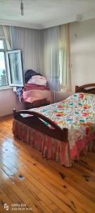 En eller flere senge i et værelse på Kesmetaş daire
