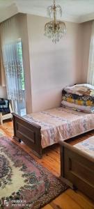 En eller flere senge i et værelse på Kesmetaş daire