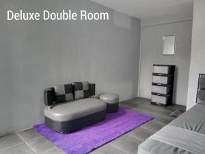 Posezení v ubytování RINA Guest House Pacitan
