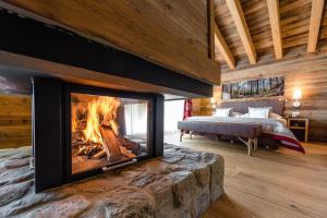 Voodi või voodid majutusasutuse Nendaz 4 Vallées & SPA 4* Superior toas