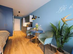 O zonă de relaxare la Seebrücke Heringsdorf - 1-Raum-Appartement mit Balkon S7a