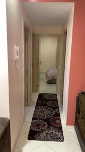 a hallway with a room with a rug on the floor at TRIO in Agadir