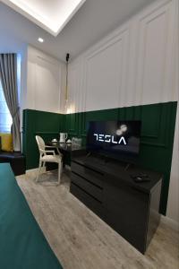 TV o dispositivi per l'intrattenimento presso Royal Wellness and Spa