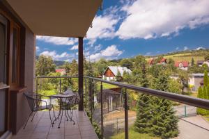 Balkón nebo terasa v ubytování PRESTIGE PARK apartament z tarasem i parkingiem