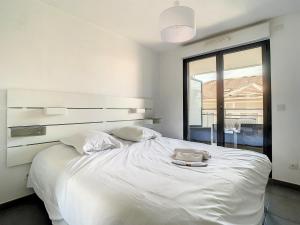 Postel nebo postele na pokoji v ubytování 2p Cannes centre-ville Terrasse