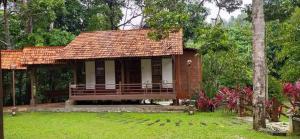 Zahrada ubytování D'Impiana Riverview Chalet # Lenggong