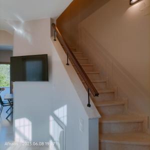 Μια τηλεόραση ή/και κέντρο ψυχαγωγίας στο Bay Villas Lefokastro