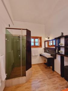 a bathroom with a shower with a glass shower stall at Kuća za odmor Neli in Sukošan +22 photos