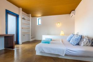 Postel nebo postele na pokoji v ubytování Hidesign Athens Villa In Sounio