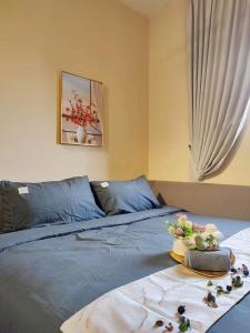 Cama o camas de una habitación en Cozy Design Homestay Taman Wahyu Batu Caves SW08 R