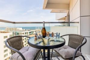 Balcony o terrace sa Miramare Apartment in Infinity Beach Resort - parking