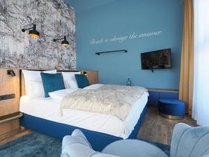 Ένα ή περισσότερα κρεβάτια σε δωμάτιο στο Seebrücke Heringsdorf - Appartement mit 1 Schlafzimmer und Balkon S16