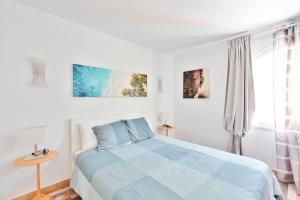 Postel nebo postele na pokoji v ubytování Vivienda Vacacional El Rinconcito