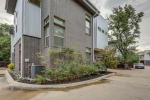 a building with a garden in front of it at Chic Austin Vacation Rental Condo Near Downtown! in Austin