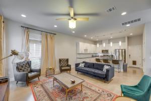 a living room with a couch and chairs and a table at Chic Austin Vacation Rental Condo Near Downtown! in Austin