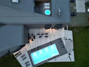 an overhead view of a swimming pool on a house at Hotel Soča in Bovec