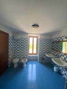 Koupelna v ubytování Casa di don Francesco + 18 fotografií