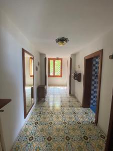 Ένα ή περισσότερα κρεβάτια σε δωμάτιο στο Casa di don Francesco
