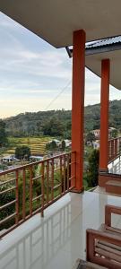 a balcony with a view of a valley at Mahakali in Kelimutu