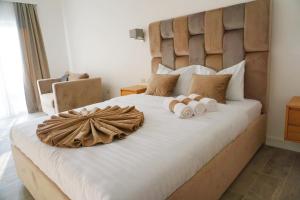 Letto o letti in una camera di Hotel Credo