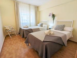 Posteľ alebo postele v izbe v ubytovaní Apartment La Goleta-1 by Interhome