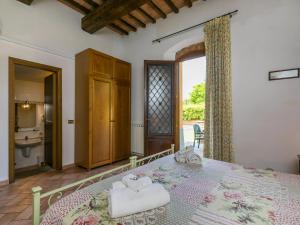 A bed or beds in a room at Apartment Montereggi-7 by Interhome