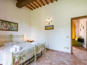 A bed or beds in a room at Apartment Montereggi-7 by Interhome