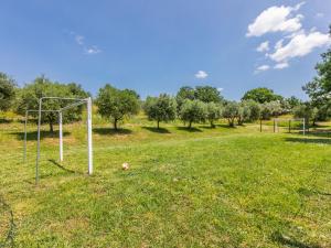 A garden outside Apartment Montereggi-7 by Interhome