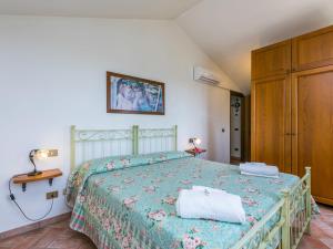 Postel nebo postele na pokoji v ubytování Apartment Montereggi-4 by Interhome