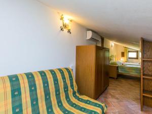 Postel nebo postele na pokoji v ubytování Apartment Montereggi-4 by Interhome