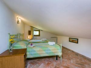 Postel nebo postele na pokoji v ubytování Apartment Montereggi-4 by Interhome