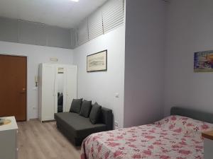 Posteľ alebo postele v izbe v ubytovaní Gardenia Napoli