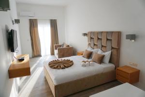 Letto o letti in una camera di Hotel Credo