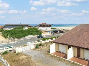 an aerial view of a house and the beach at Apartment Côte Sud-4 by Interhome in Mimizan-Plage