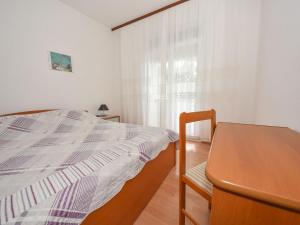 Postel nebo postele na pokoji v ubytování Apartment Vesela-2 by Interhome
