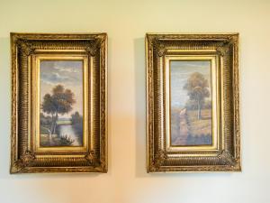 due quadri di alberi su un muro di ;Corte Arcadia 306S a San Martino della Battaglia