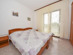 Postel nebo postele na pokoji v ubytování Apartment Vesela-4 by Interhome + 19 fotografií
