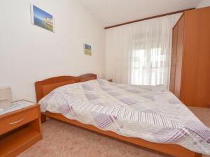 Postel nebo postele na pokoji v ubytování Apartment Vesela-4 by Interhome