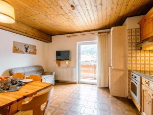 A kitchen or kitchenette at Apartment Mantina-2 by Interhome
