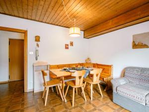 A seating area at Apartment Mantina-2 by Interhome