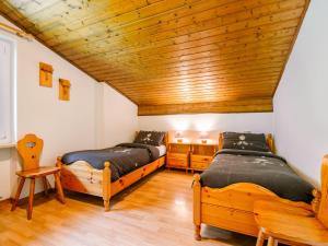 A bed or beds in a room at Apartment Mantina-2 by Interhome