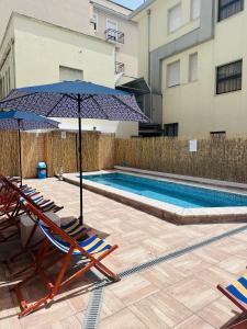 Bazén v ubytování Hotel Adria Nuova nebo v jeho okolí