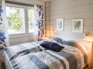 En eller flere senge i et værelse på Holiday Home Vuokatin atso by Interhome + 18 billeder