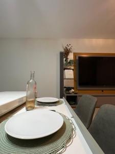 Μια τηλεόραση ή/και κέντρο ψυχαγωγίας στο Nannai Residence - Apartamento Duplex